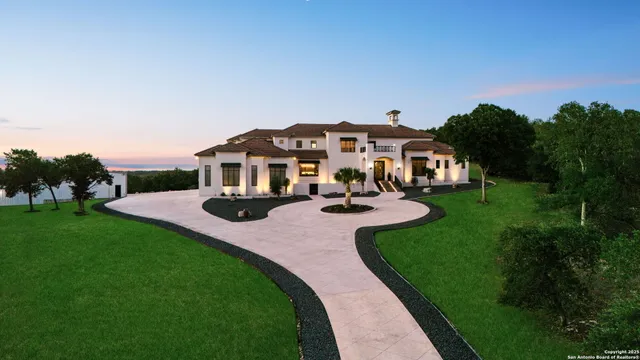 a view of a house with a yard porch and sitting area