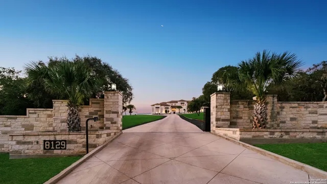 a view of a street with a building in the background