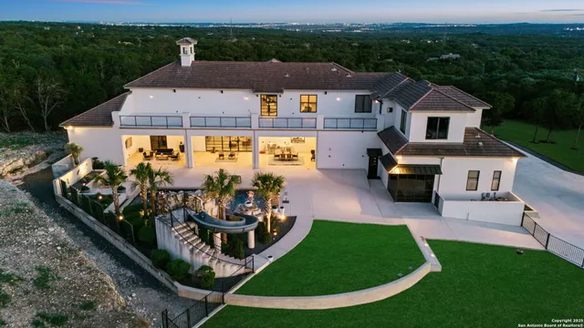 an aerial view of a house with garden