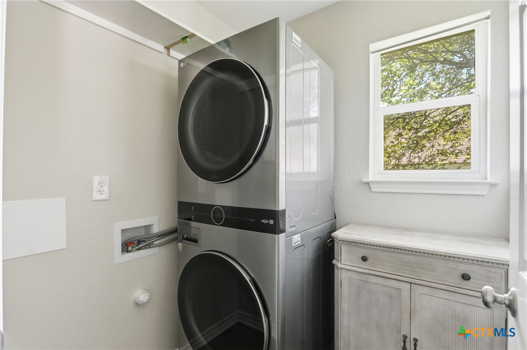 2208 Stonecrest Path New Braunfels, TX 78130 - Photo 20 of 23 Laundry Room off kitchen