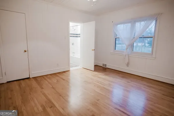 a bathroom with a bathtub and a sink