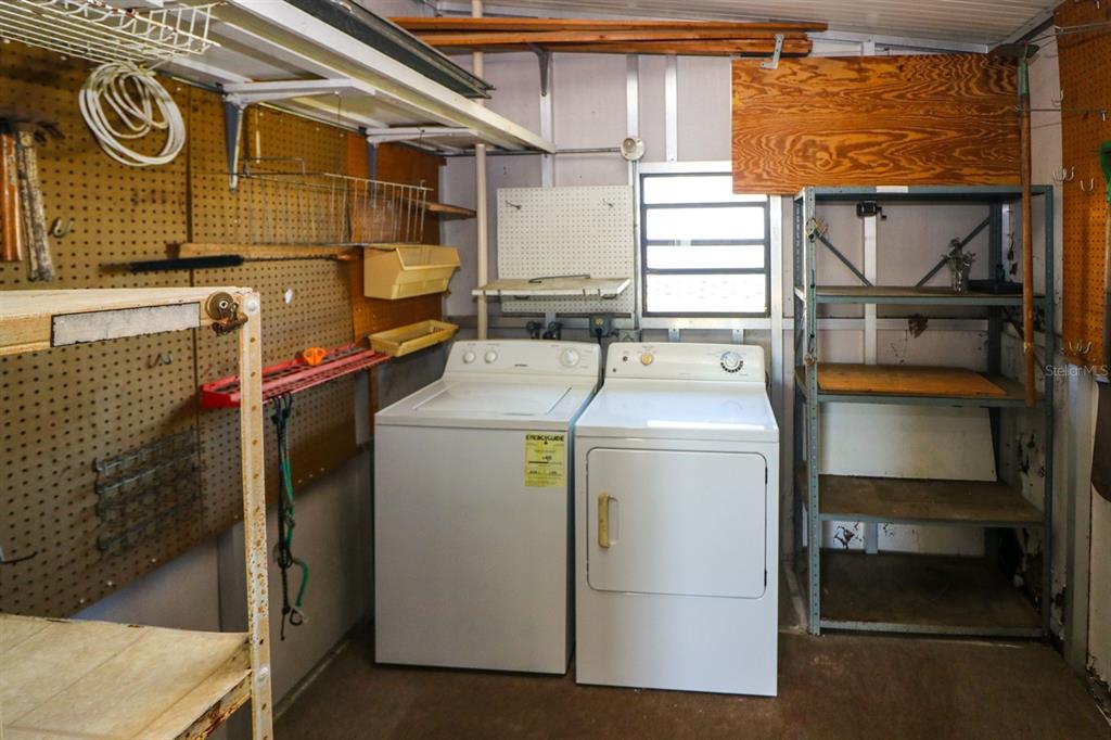 29200 South Jones Loop Road, Unit 176 Punta Gorda, FL 33950 - Photo 24 of 31 a utility room with dryer and washer