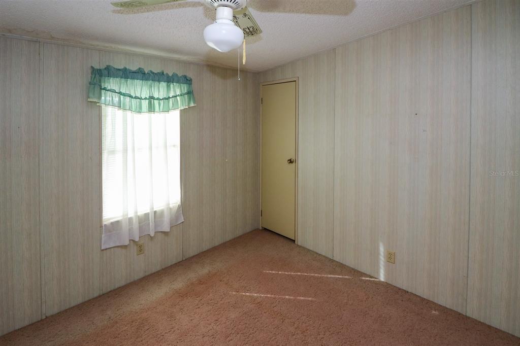 29200 South Jones Loop Road, Unit 176 Punta Gorda, FL 33950 - Photo 29 of 31 a view of an empty room with a window