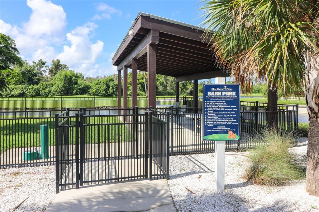 29200 South Jones Loop Road, Unit 176 Punta Gorda, FL 33950 - Photo 4 of 31 a view of a wrought iron fences in front of house