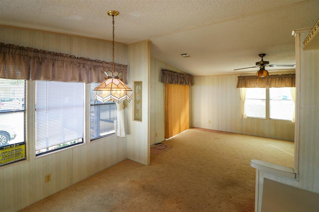 29200 South Jones Loop Road, Unit 176 Punta Gorda, FL 33950 - Photo 10 of 31 a view of an empty room with a window