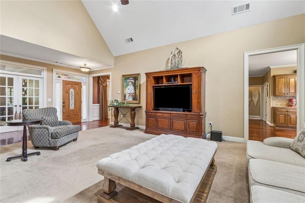 20 Stampede Pass Rydal, GA 30171 - Photo 13 of 77 a living room with furniture and a flat screen tv