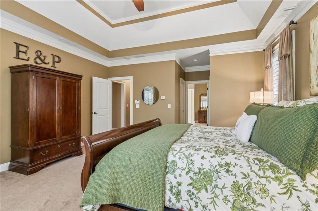 20 Stampede Pass Rydal, GA 30171 - Photo 35 of 77 a bedroom with a bed and a mirror