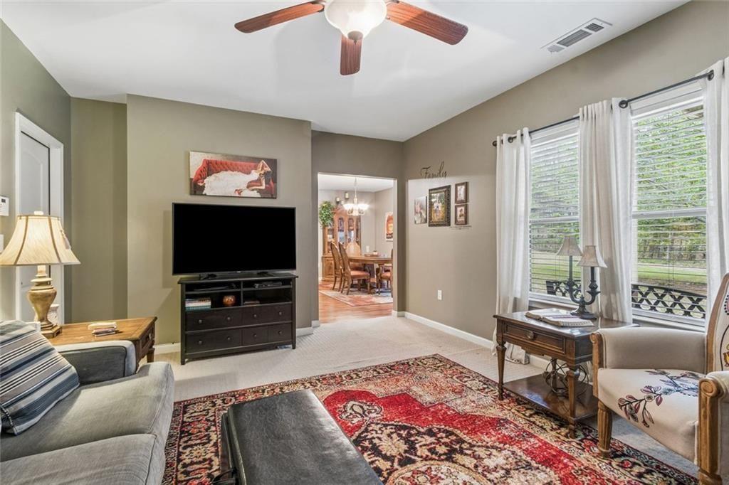 20 Stampede Pass Rydal, GA 30171 - Photo 50 of 77 a living room with furniture and a flat screen tv
