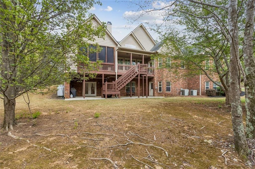 20 Stampede Pass Rydal, GA 30171 - Photo 75 of 77 a front view of a house with a yard