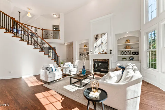 a kitchen with granite countertop a sink stove and cabinets
