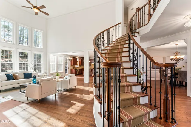 a kitchen with granite countertop wooden cabinets a stove and oven with wooden floor