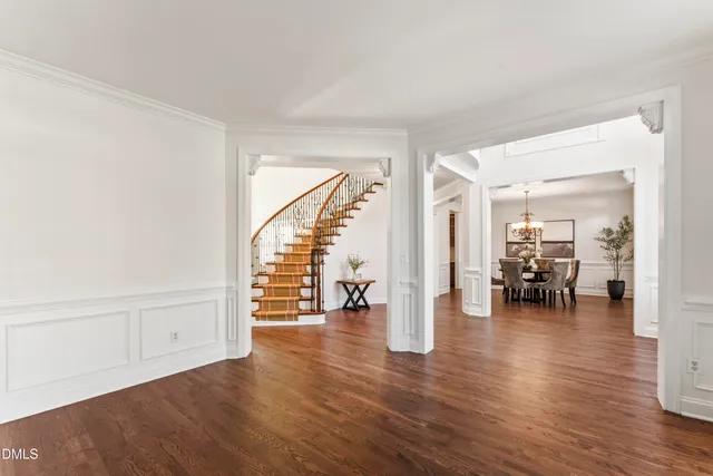 a bathroom with a sink a mirror a bathtub and a toilet