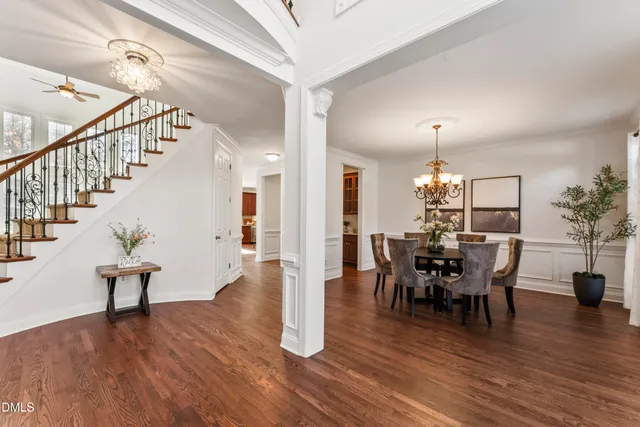 a view of a porch with furniture and floor to ceiling window