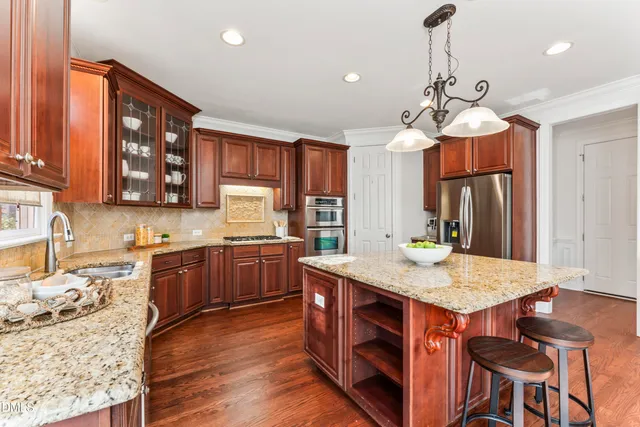 a view of a chandelier fan in a room
