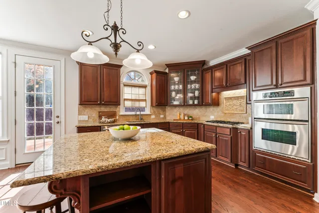 a bathroom with a bathtub and a toilet