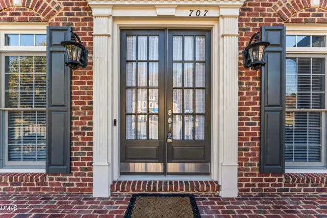 a view of entryway with wooden floor