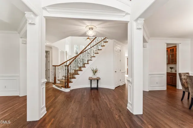 a kitchen with granite countertop cabinets and black appliances