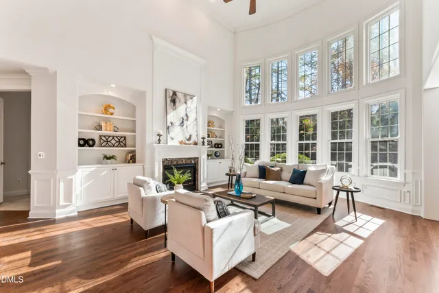 a kitchen with a stove a sink a refrigerator and wooden cabinets