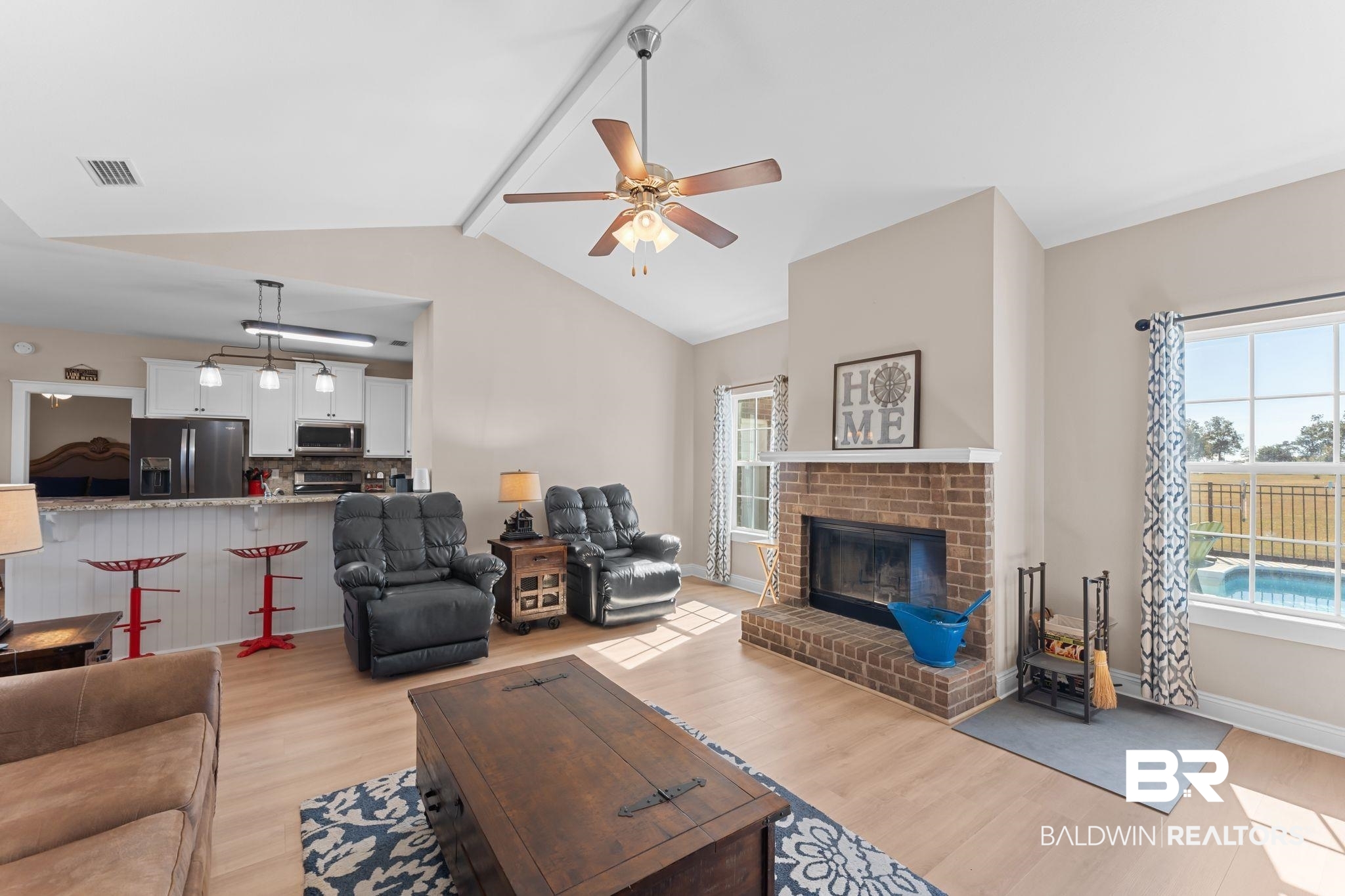 28980 Comstock Road Elberta, AL 36530 - Photo 5 of 38 Living room featuring light wood-style flooring, healthy amount of natural light, and a ceiling fan
