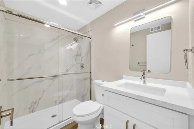 a bathroom with a sink a toilet and a bathtub