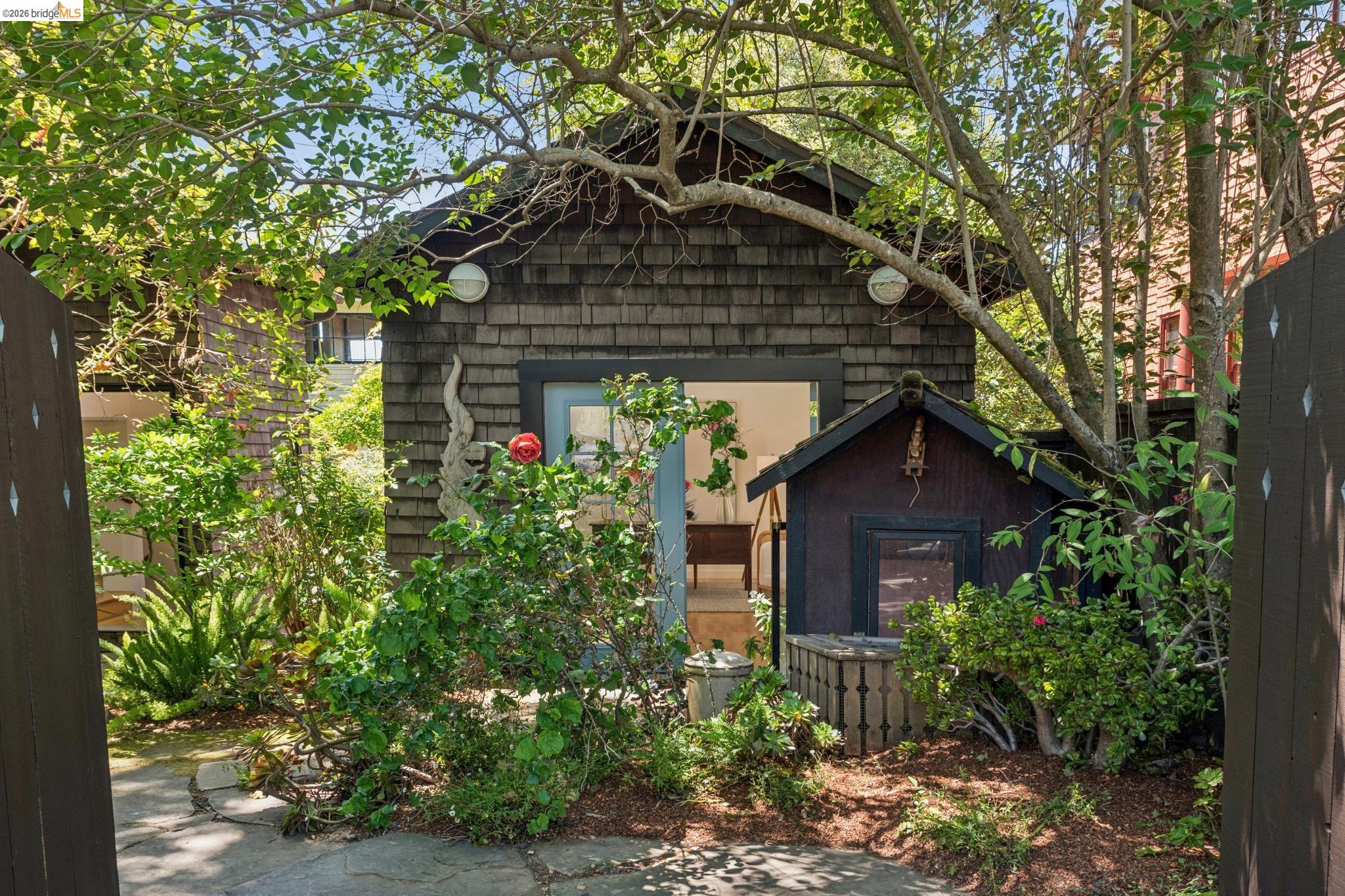 1490 Arch Street Berkeley, CA 94708 - Photo 45 of 57 a view of a house with large trees