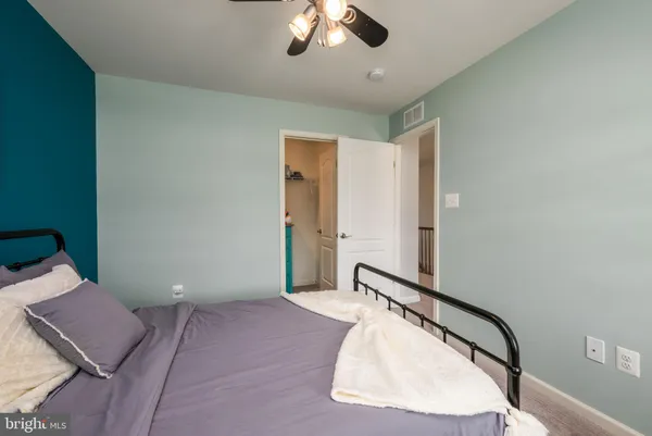 a view of a livingroom with a ceiling fan