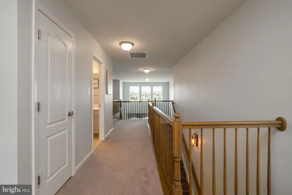 a view of hallway with livingroom