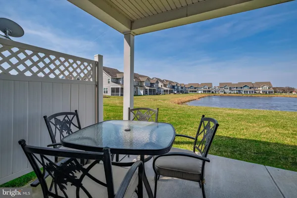 a view of a patio with swimming pool
