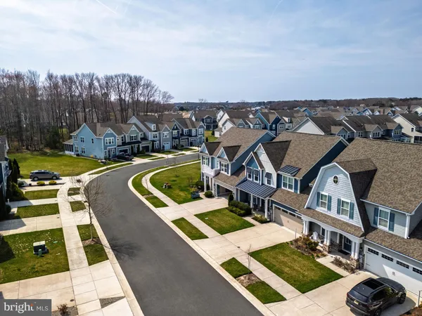 a view of a swimming pool with seating area