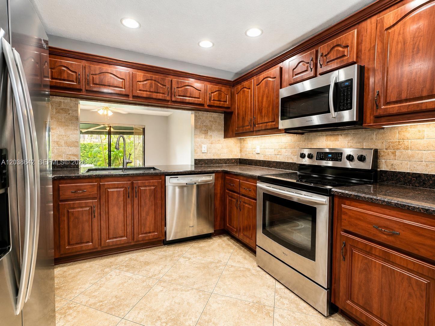 5476 Gate Lake Road, Unit 5476 Tamarac, FL 33319 - Photo 2 of 32