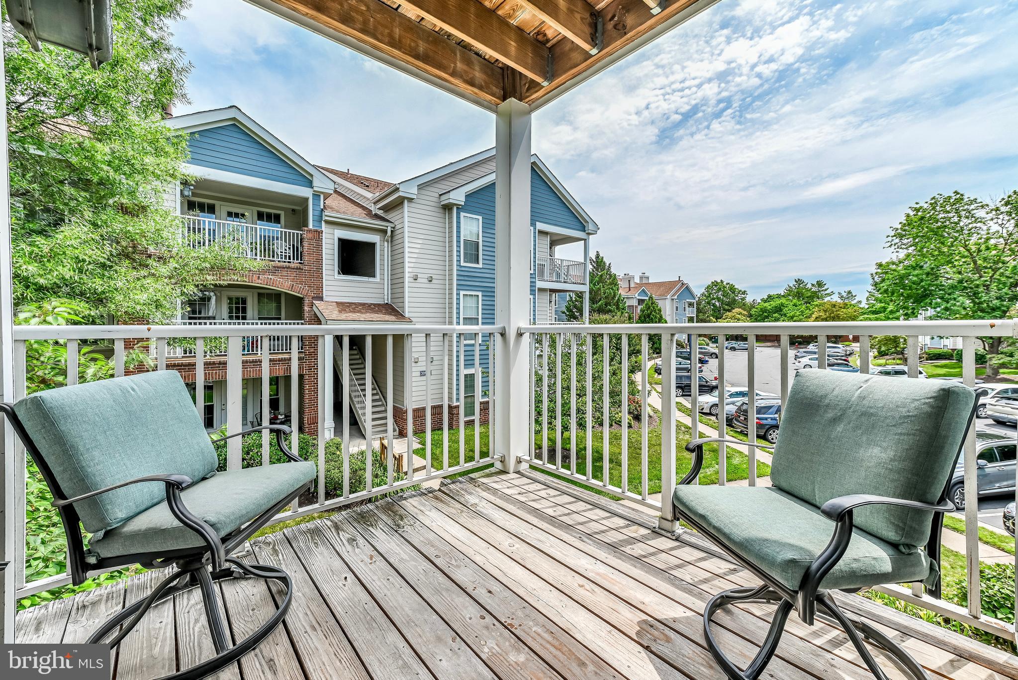 20991 Timber Ridge Terrace, Unit 204 Ashburn, VA 20147 - Photo 25 of 27 View From The Balcony Off The Dining Room