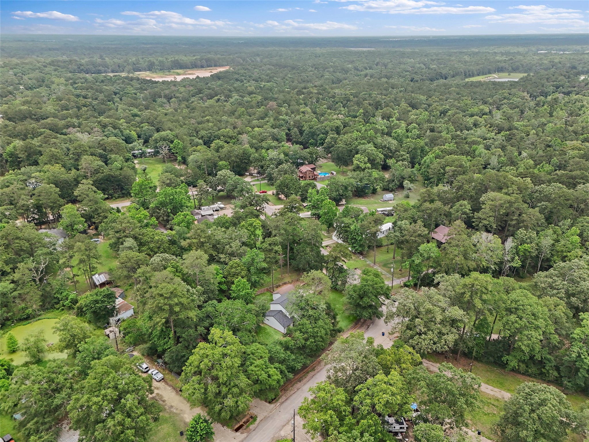 18009 Split Oak Circle New Caney, TX 77357 - Photo 30 of 30 a view of a yard with an outdoor and trees