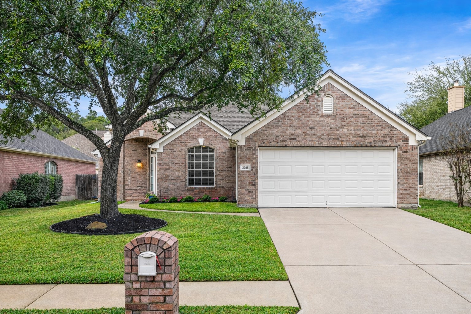 2218 Louetta Brook Lane Spring, TX 77388 - Photo 2 of 18 a front view of a house with a yard