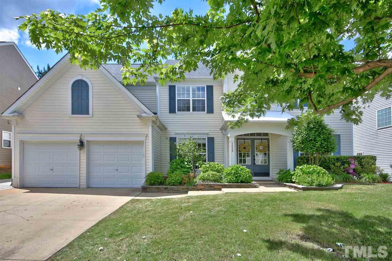 7532 Silver View Lane Raleigh, NC 27613 - Photo 2 of 30 Charming curb appeal with flower beds and a covered front porch. 2 car garage and ready to move into with new paint, new roof, new flooring, and new windows!