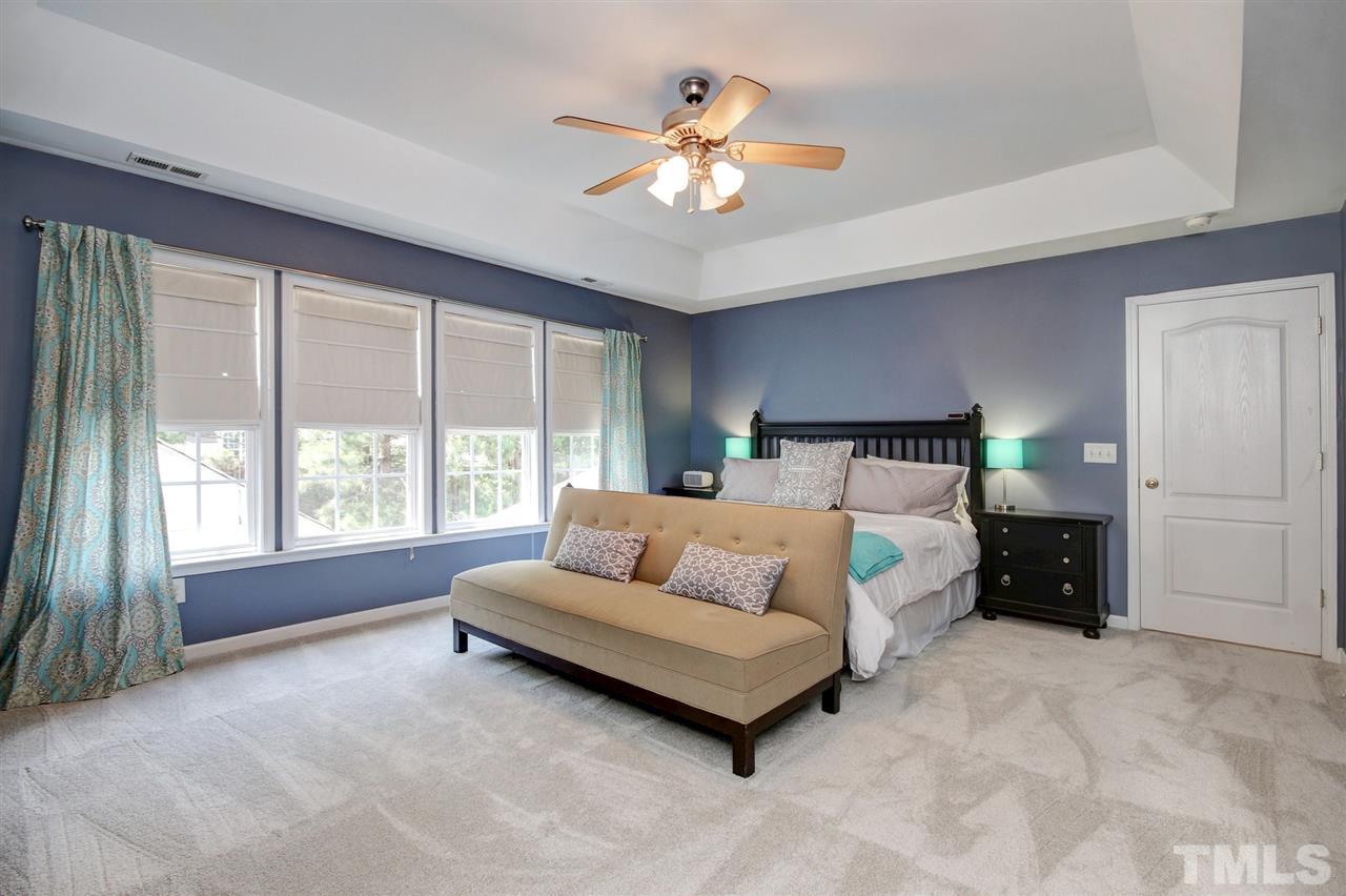 7532 Silver View Lane Raleigh, NC 27613 - Photo 14 of 30 Tray ceiling and soothing paint colors along with new carpet.