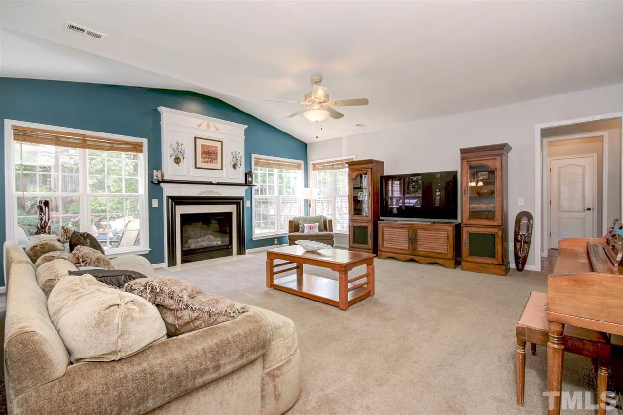 7532 Silver View Lane Raleigh, NC 27613 - Photo 8 of 30 Additional view of the HUGE family room with new carpet and new windows installed the 1st week of May 2019.