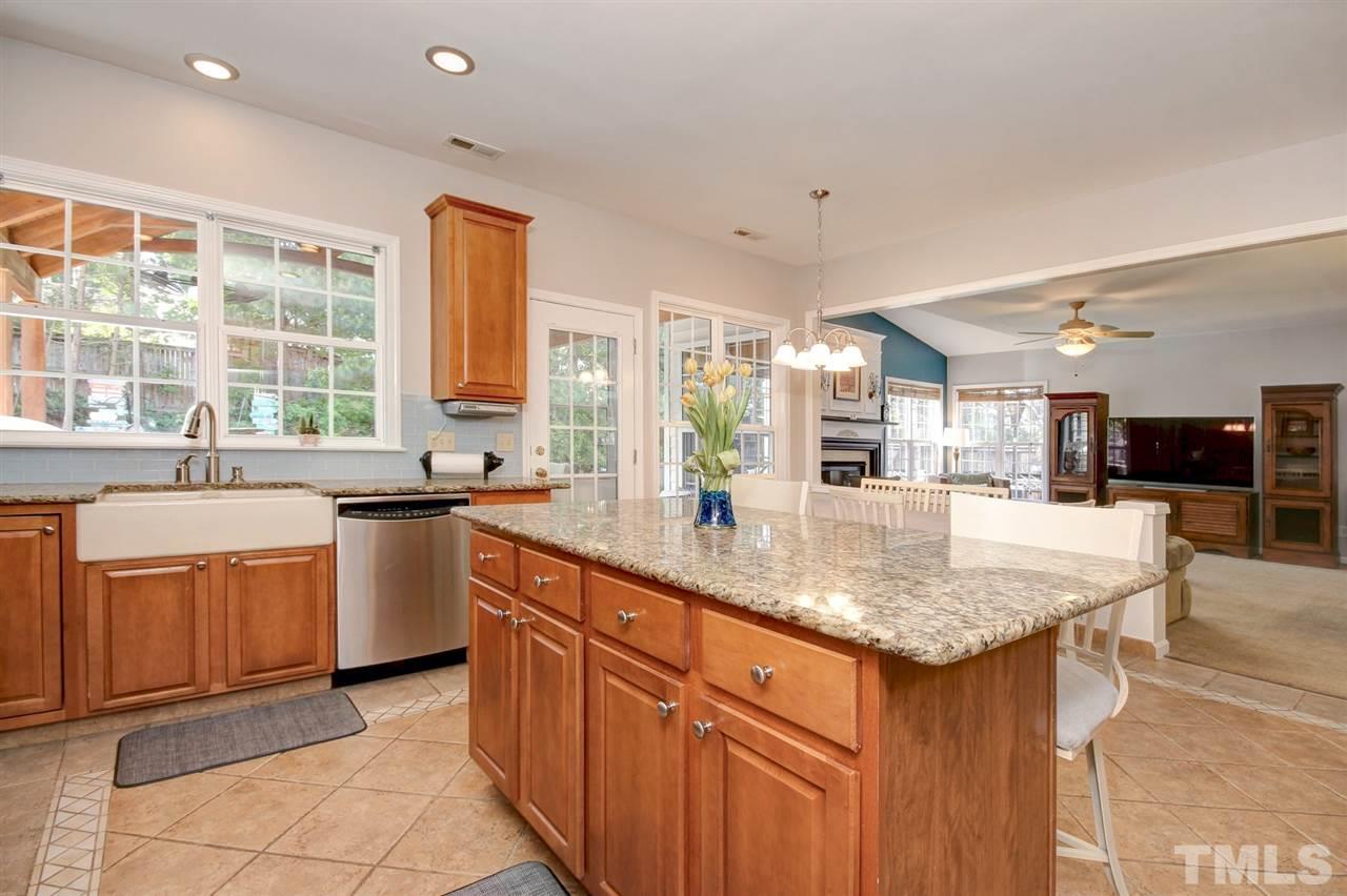 7532 Silver View Lane Raleigh, NC 27613 - Photo 10 of 30 Island with storage and great for food prep during holiday dinners or family get togethers.