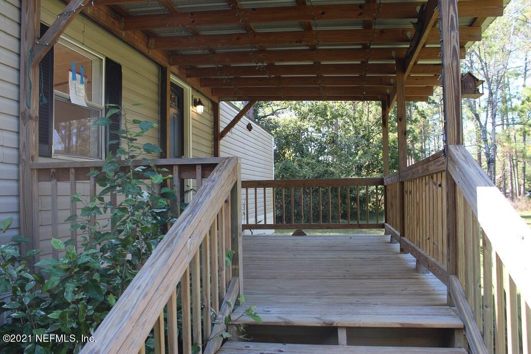 4081 Old Jennings Road, Unit A Middleburg, FL 32068 - Photo 4 of 16 wood front porch