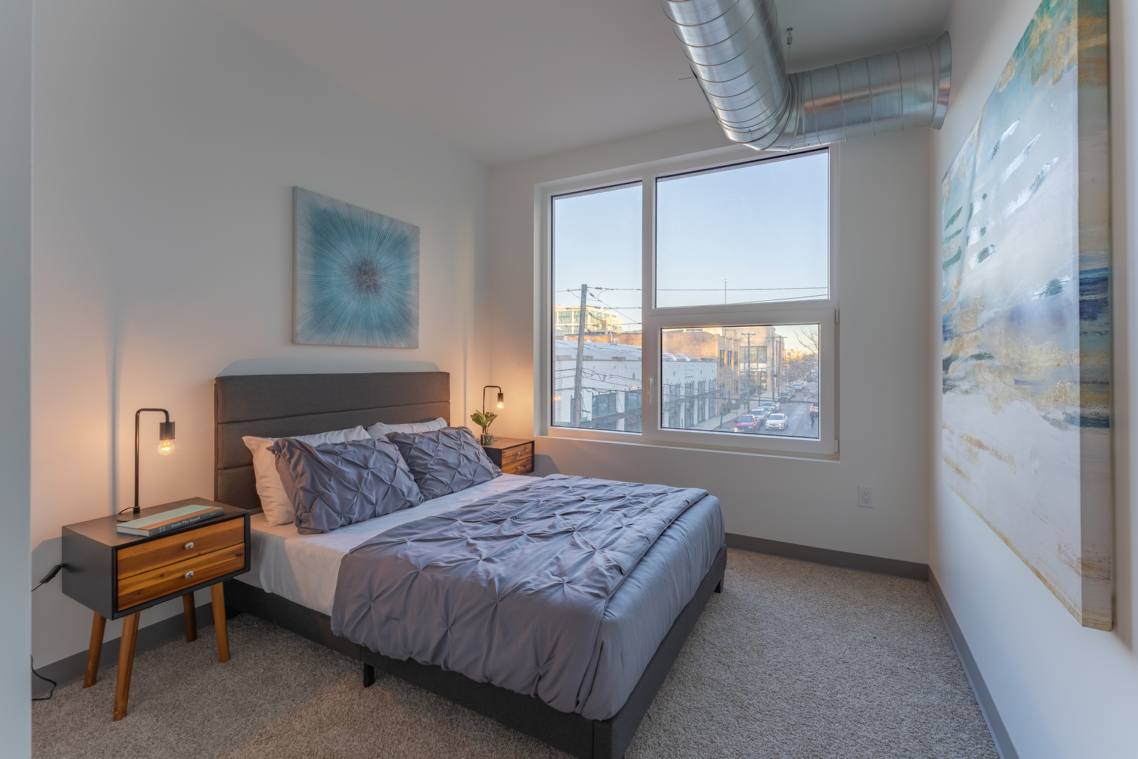 Undisclosed Address Chicago, IL 60642 - Photo 11 of 15 a bedroom with a bed and a window