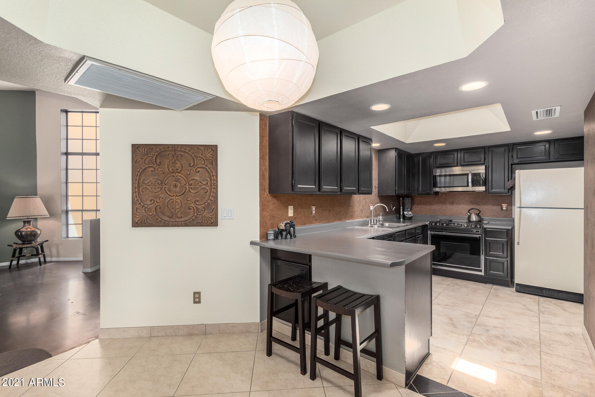 2848 East Brown Road, Unit 17 Mesa, AZ 85213 - Photo 15 of 36 19 - Brown Kitchen