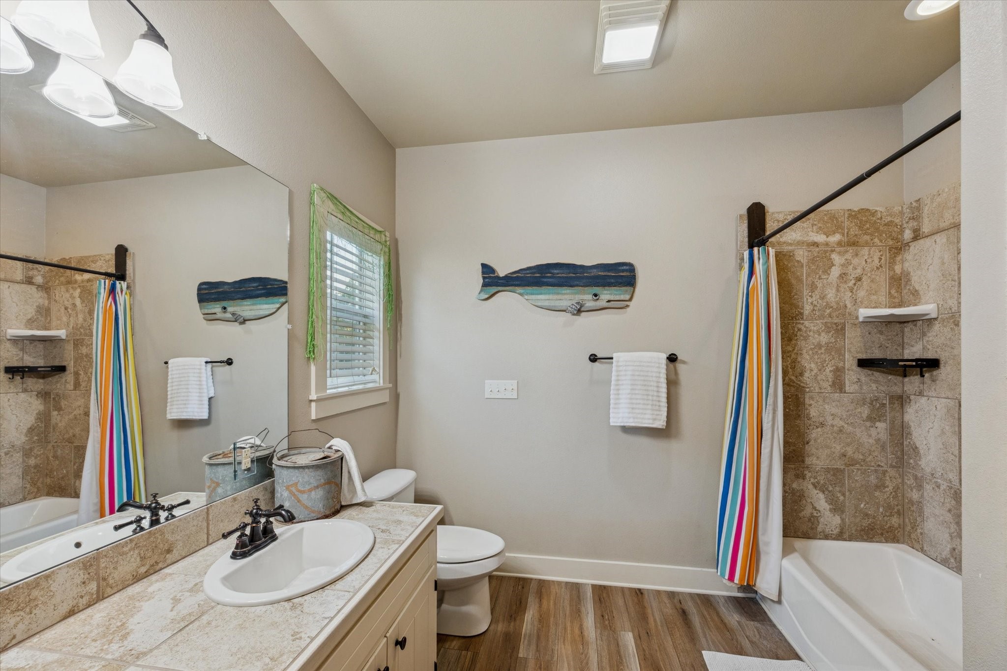 2510 Round Top Road Round Top, TX 78954 - Photo 11 of 20 a bathroom with a sink toilet and shower