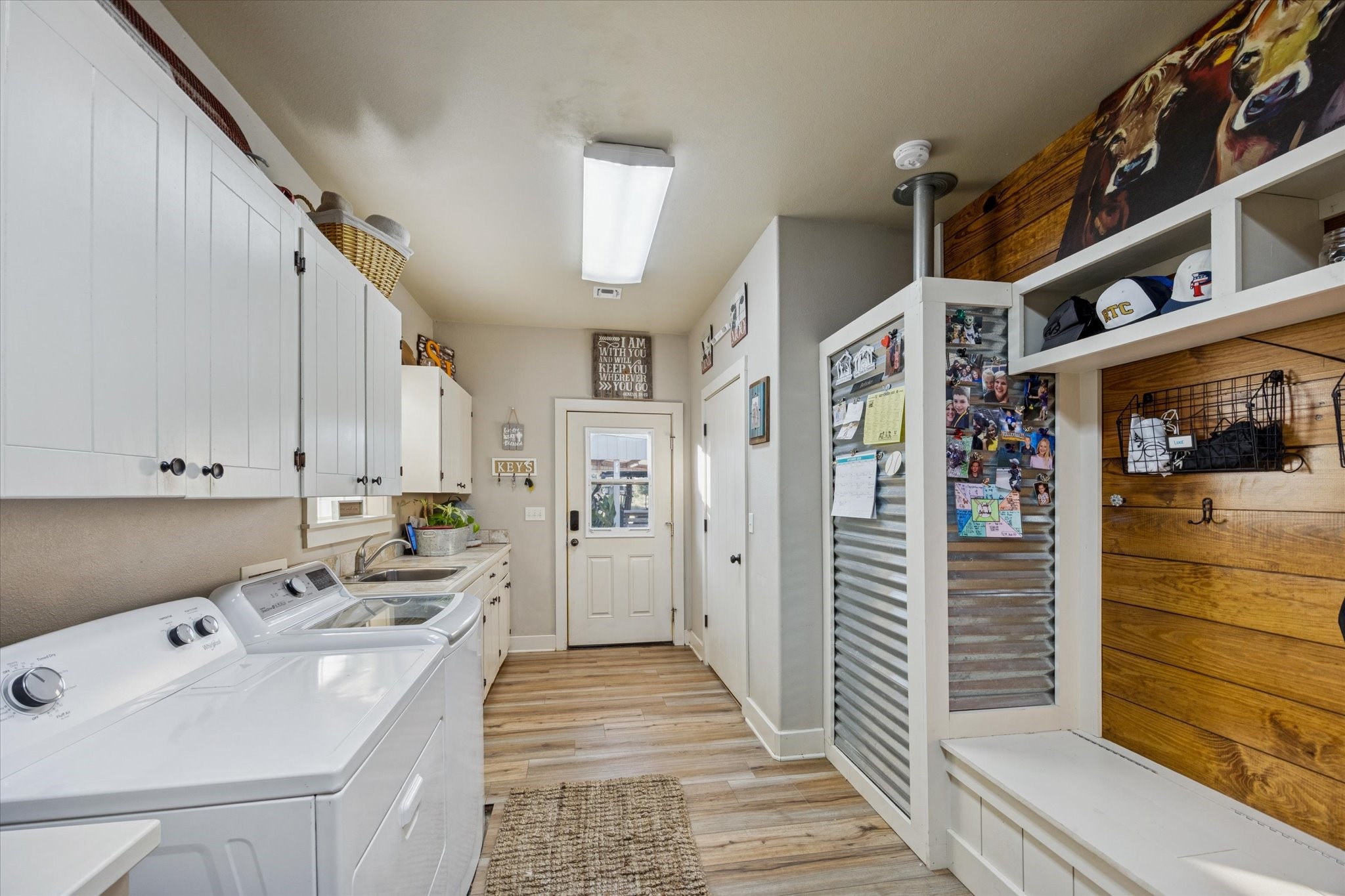 2510 Round Top Road Round Top, TX 78954 - Photo 13 of 20 a kitchen with stainless steel appliances sink stove and cabinets