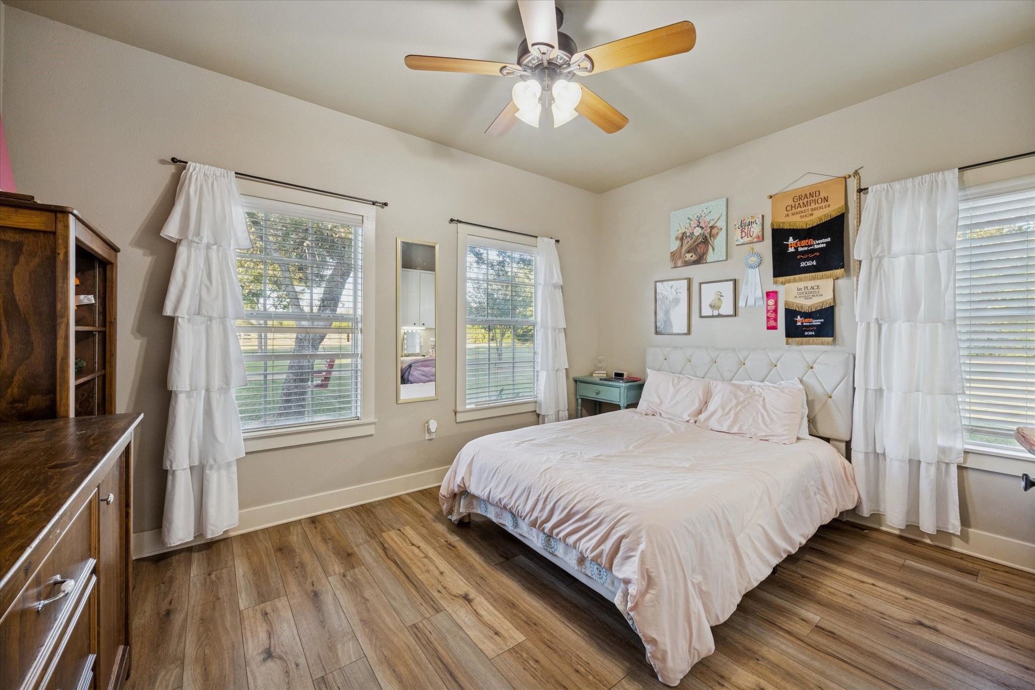 2510 Round Top Road Round Top, TX 78954 - Photo 9 of 20 a bedroom with a bed dresser and a window