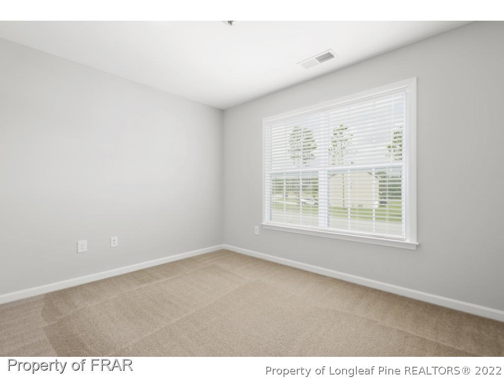162 Watchmen Lane Cameron, NC 28326 - Photo 11 of 23 an empty room with a window