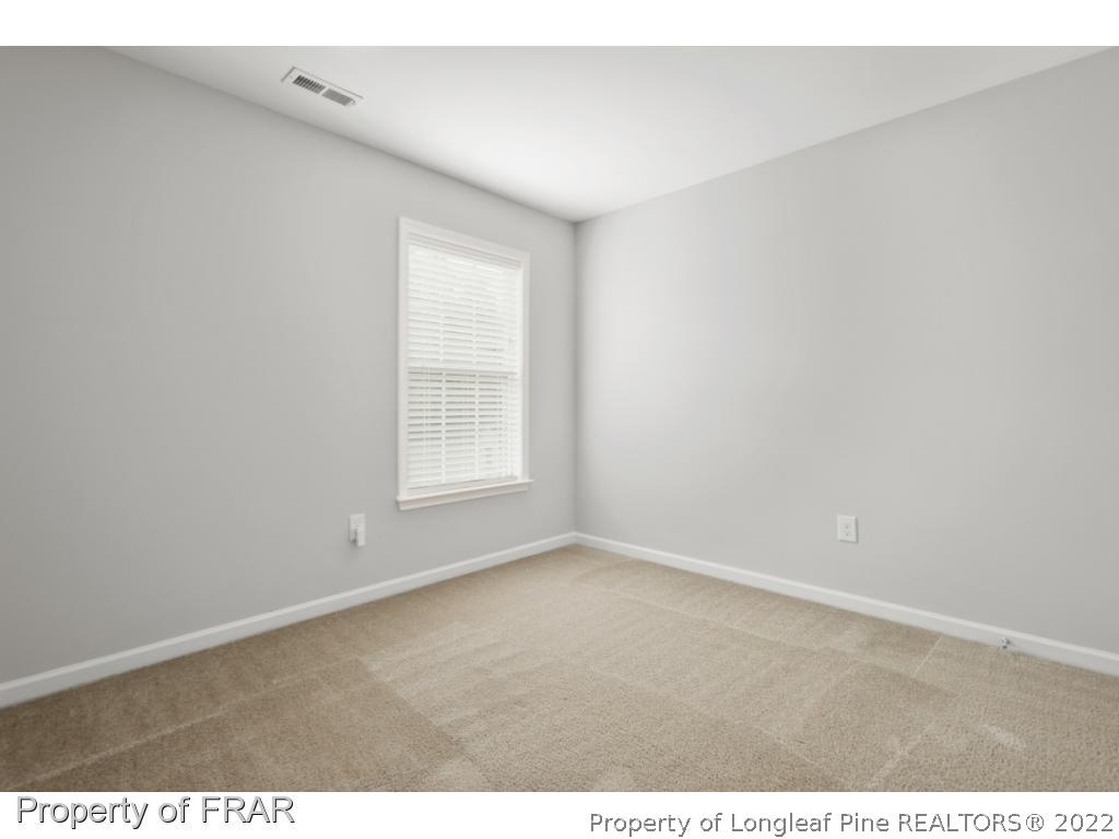 162 Watchmen Lane Cameron, NC 28326 - Photo 12 of 23 a view of an empty room with a window