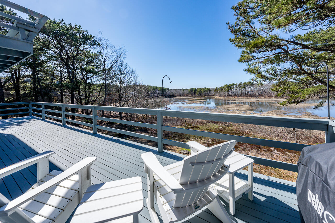 210 Lieutenant Island Road Wellfleet, MA 02667 - Photo 14 of 47 a view of a roof deck with couches and wooden floor