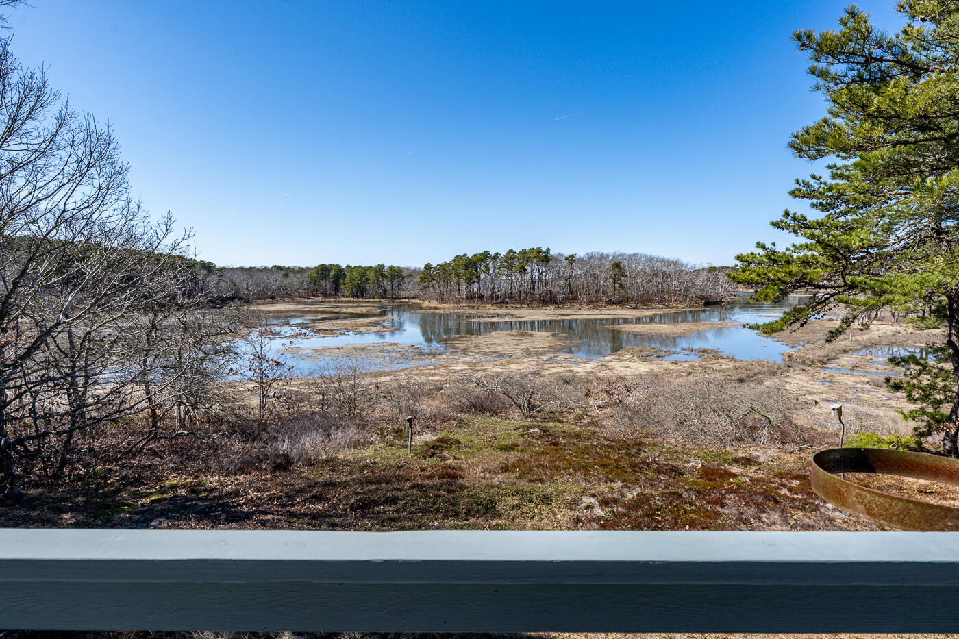 210 Lieutenant Island Road Wellfleet, MA 02667 - Photo 15 of 47 a view of a lake with a yard