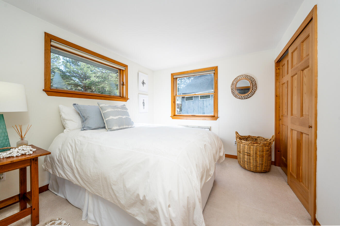 210 Lieutenant Island Road Wellfleet, MA 02667 - Photo 16 of 47 a bedroom with a bed and a painting on the wall
