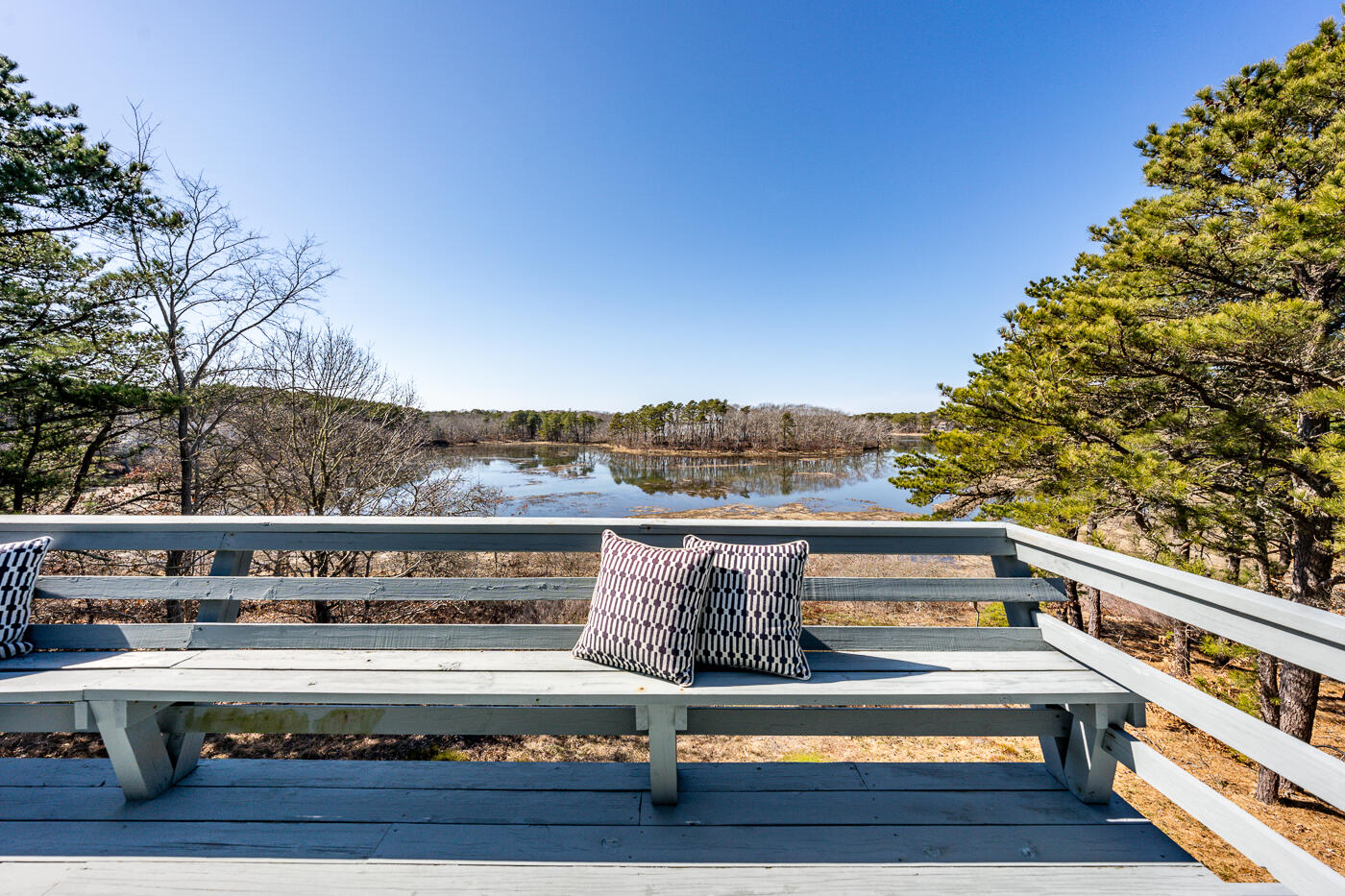 210 Lieutenant Island Road Wellfleet, MA 02667 - Photo 24 of 47 a view of a balcony with furniture and city view