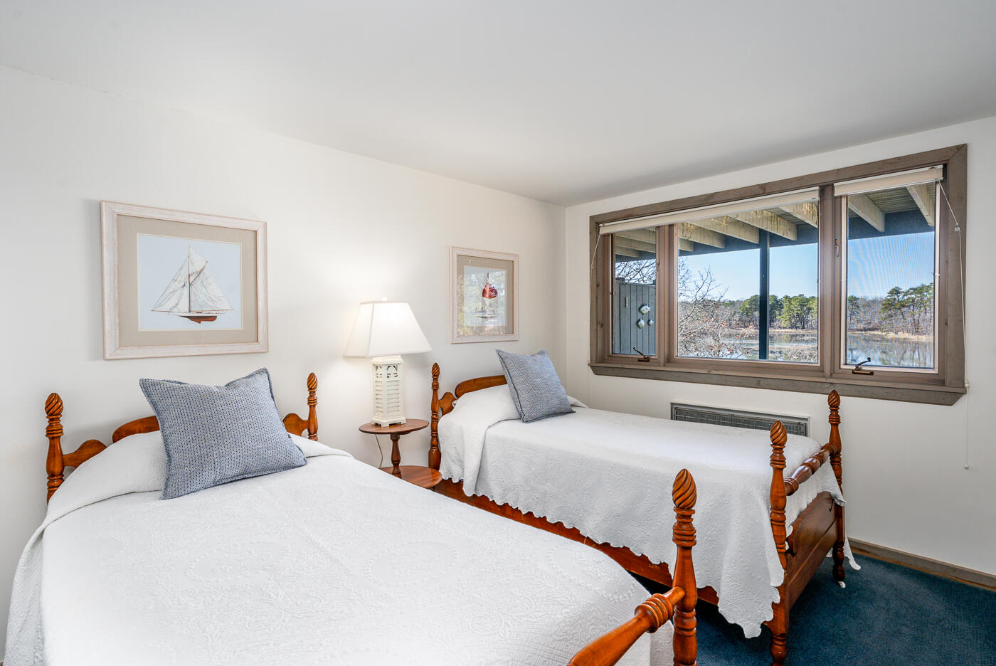 210 Lieutenant Island Road Wellfleet, MA 02667 - Photo 32 of 47 a bedroom with two beds and a window